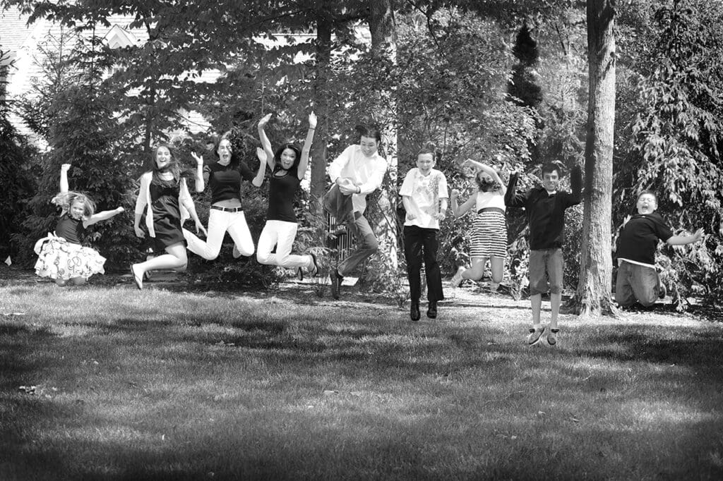 A group of people jumping in the air.